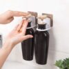 03_daf6a7c4-7680-49cd-b334-82b7fe1d23bb.jpg Wall-Mounted Adhesive Hook for Shampoo & Soap, Strong Hold (1pc)