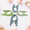 03_71bd66f2-1c60-4402-afe5-95425e163e7e.jpg Travel Hangers, Portable Folding Clothes Hangers (4 Pc / Big)