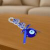 03_725cd504-d39d-4d66-a27a-d0ecf61bf7ad.jpg Decorative Double OM Symbol Evil Eye Hanging (1 Pc)