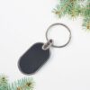 05_e2f74ce6-6f70-4b29-9baf-318689039c39.jpg Elegant Black & Silver Oval Metal Keychain (1 Pc)