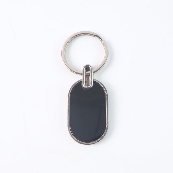 06_1c77b0d8-f1ac-47dc-a0dd-f346bcbb7366.jpg Elegant Black & Silver Oval Metal Keychain (1 Pc)