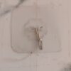 a43b607b-40fc-40b9-9613-759a54f62e36_ff5c73e6-1846-4d31-8c32-6bbeb641b223.jpg Self Adhesive Transparent Wall Hook (1 Pc)
