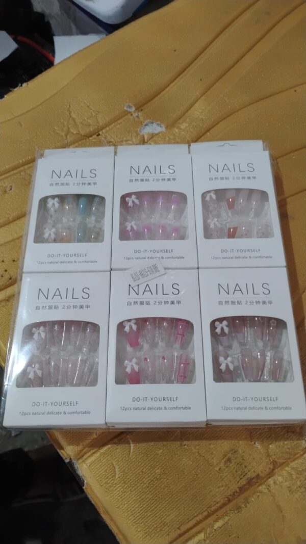 c5a9c178-f203-4f62-9f4d-cd4473375aaa_6e16cac4-1ed5-4717-b075-70b04ee3e5a9.jpg Reusable Press-On Artificial Nails with Adhesive Stickers (1 Pkt)