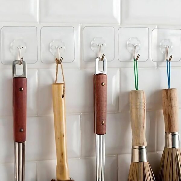 hook-05_dd9ee0ec-d540-40e5-8629-18ccd7aa8ed7.jpg Self Adhesive Transparent Wall Hook (1 Pc)